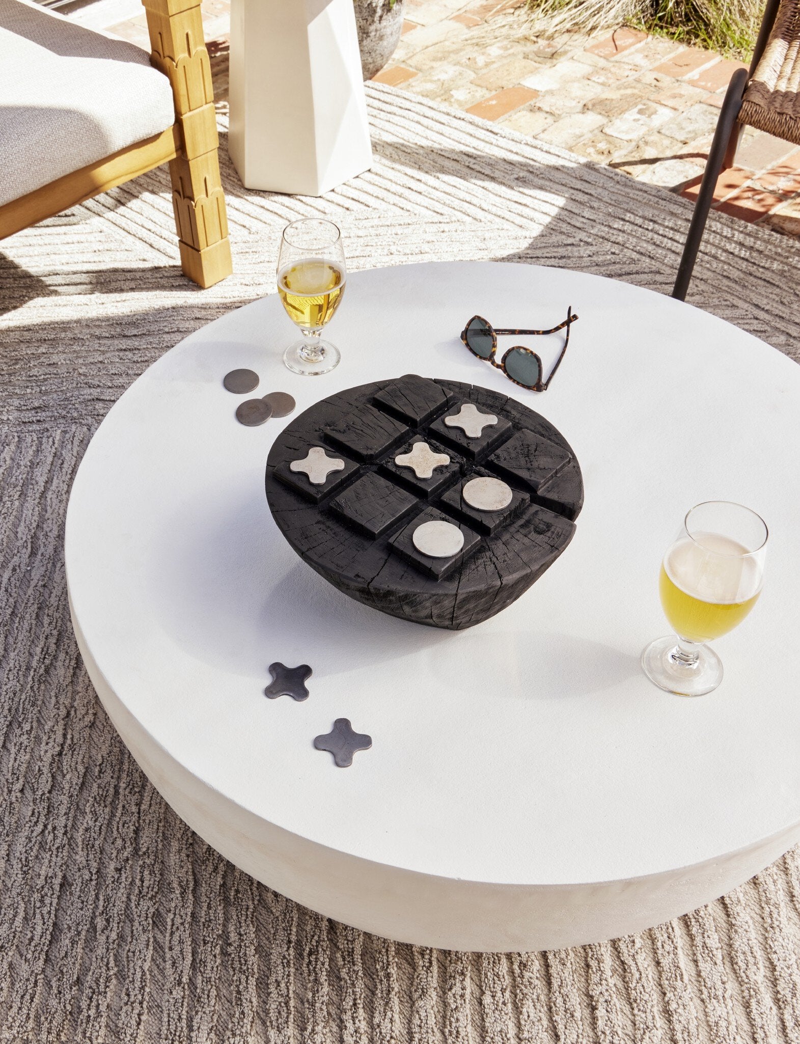 Four Hands Basil Outdoor Round Coffee Table — Matte White Cast Aluminum