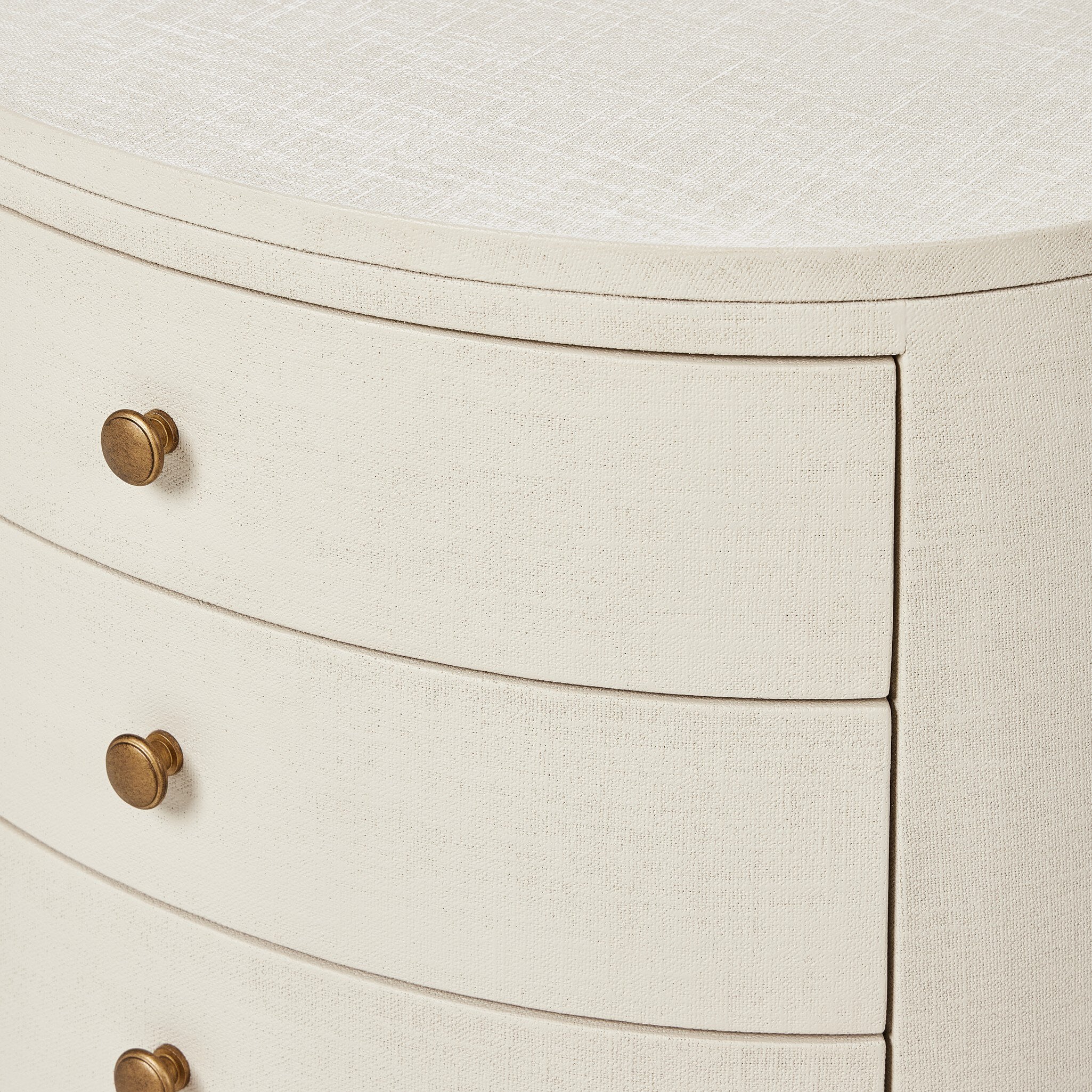 Four Hands Amelia Oval Nightstand — Ivory Painted Linen-Light Antique Brass in Aluminum