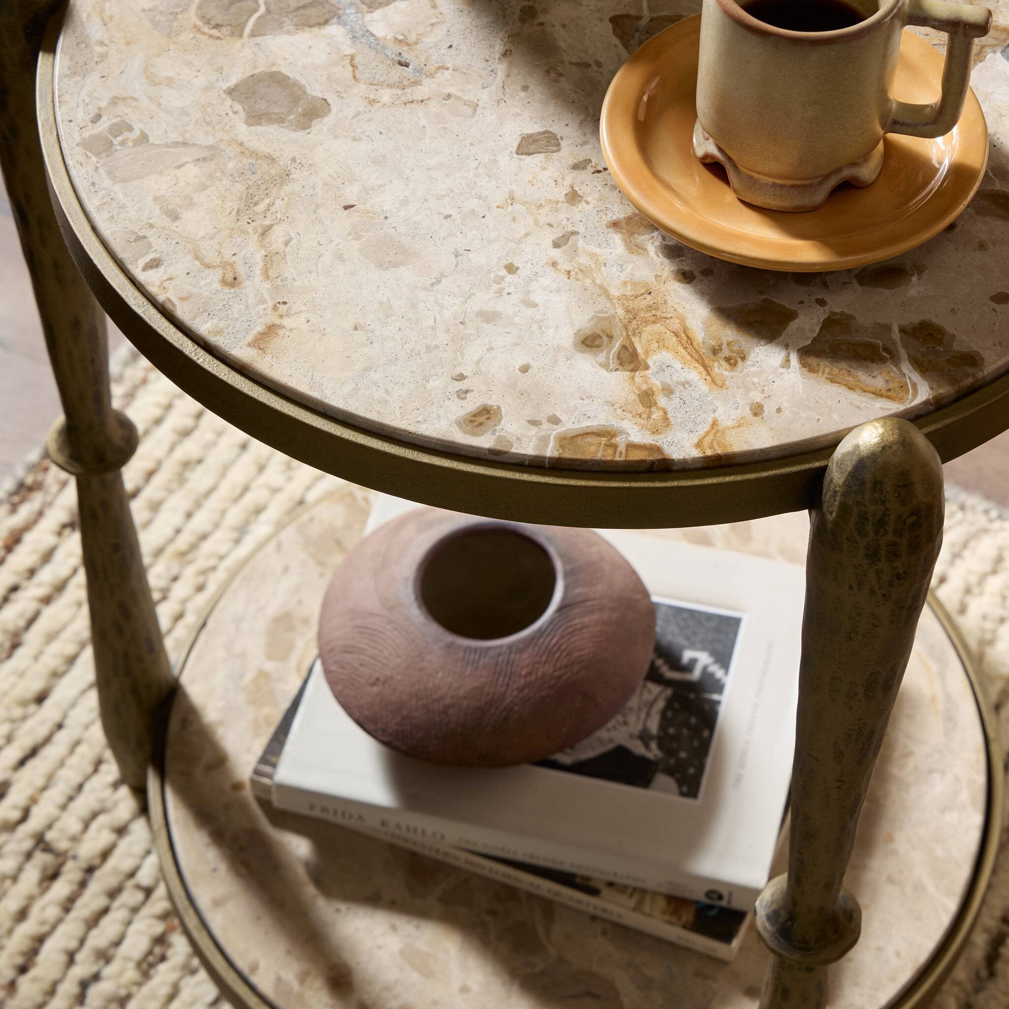 Four Hands Ruthie End Table — Fossil Marble-Tapered Hammered Aged Brass
