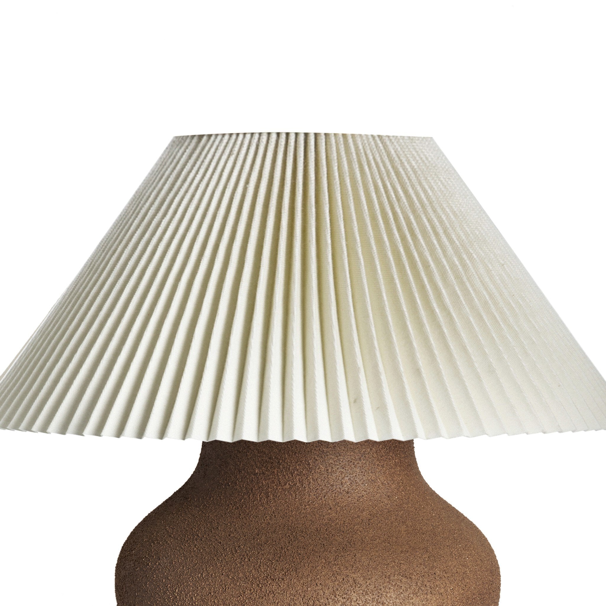 Four Hands Parma Table Lamp — Textured Dark Sand Porcelain-Pleated Ivory Linen