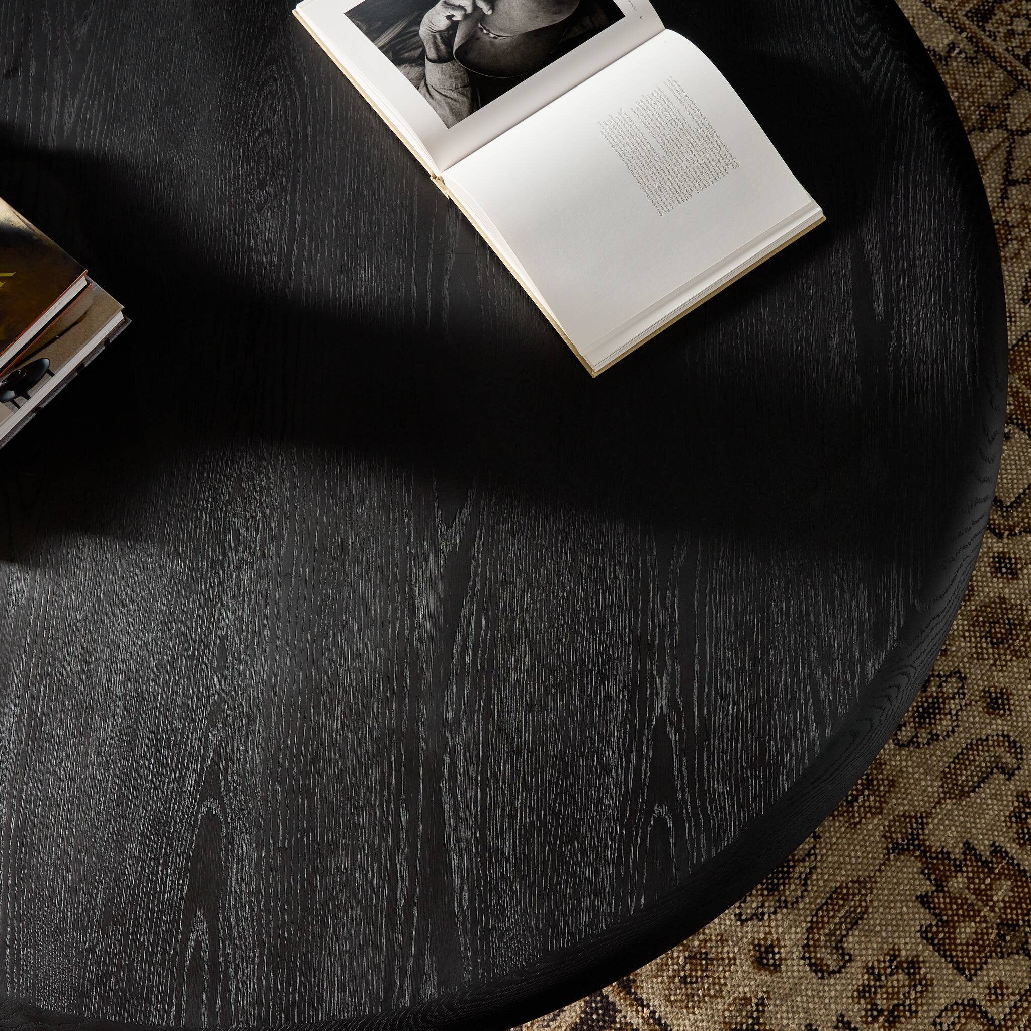 Four Hands Rosenell Round Coffee Table — Black Oak Veneer-Black Oak Solid-Black Paper Cord
