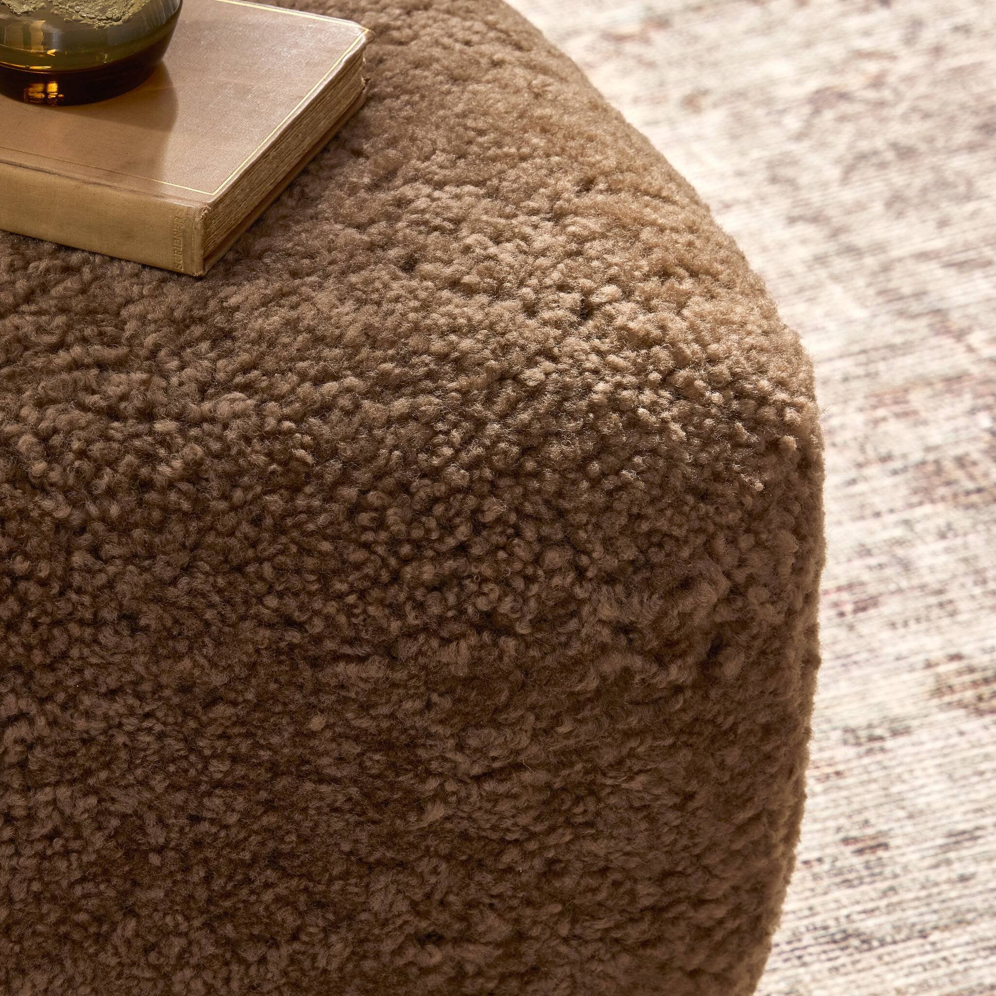 Four Hands Joey Ottoman — Amber Shearling-Hammered Black