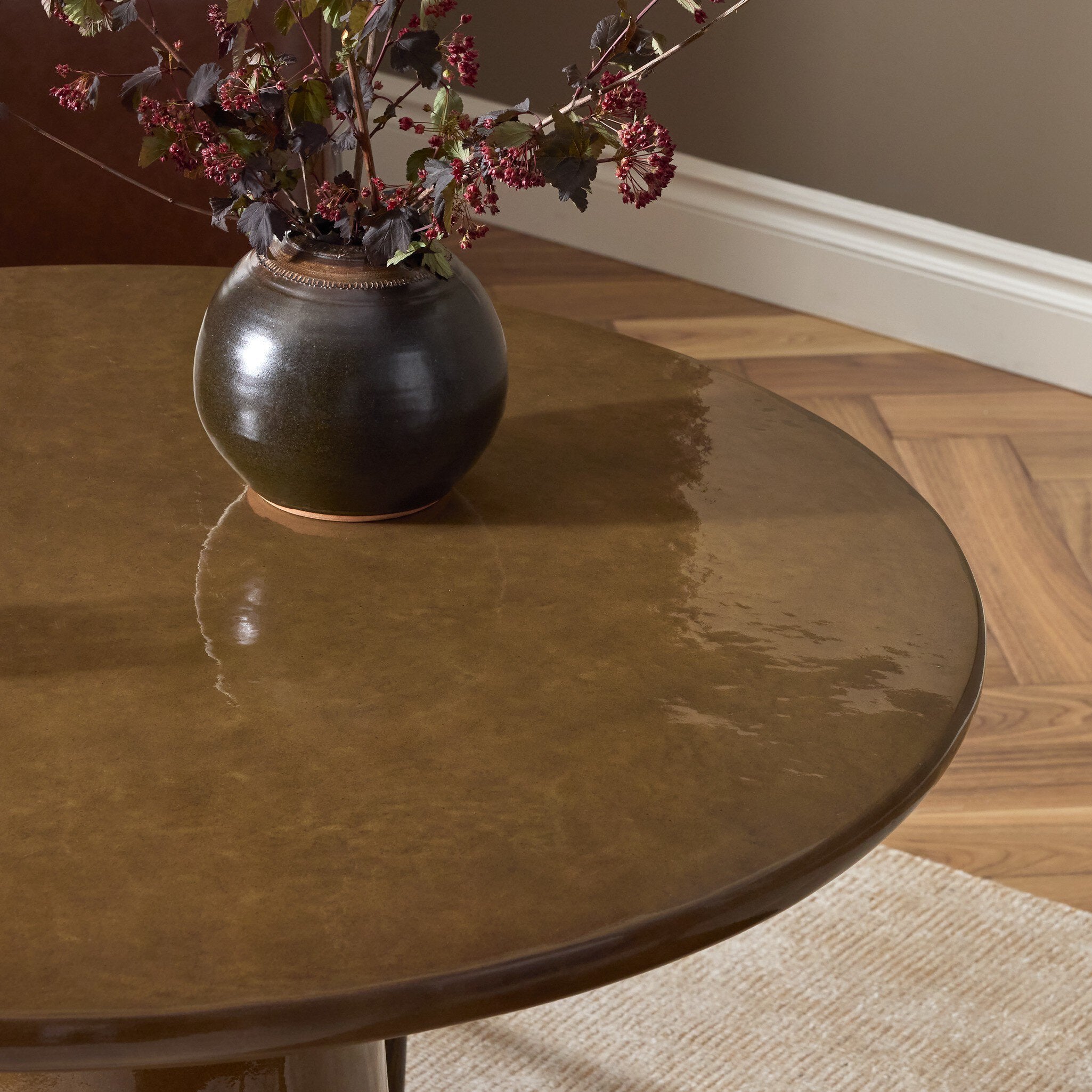 Four Hands Maudlin Bistro Table — Glossy Ochre Concrete