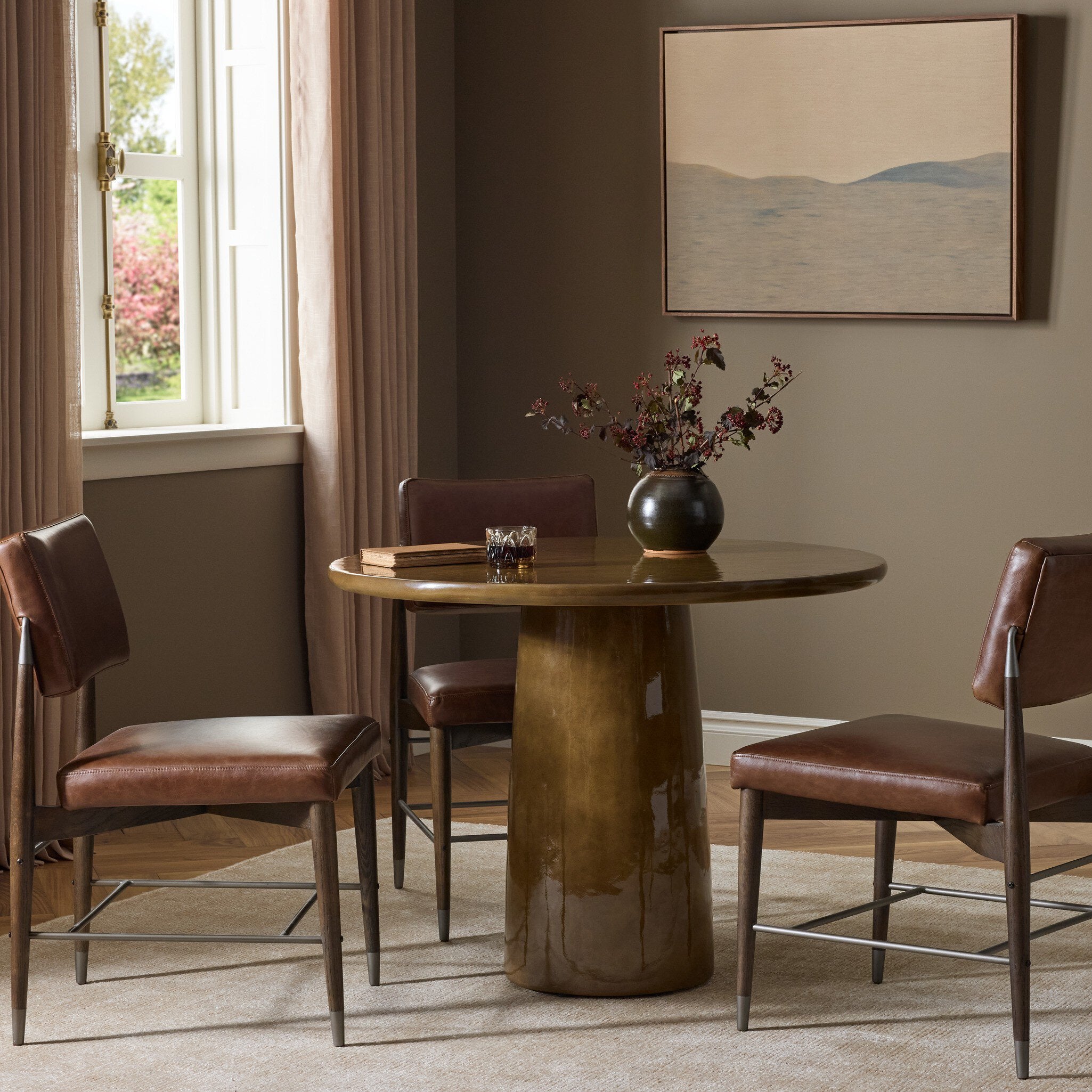 Four Hands Maudlin Bistro Table — Glossy Ochre Concrete