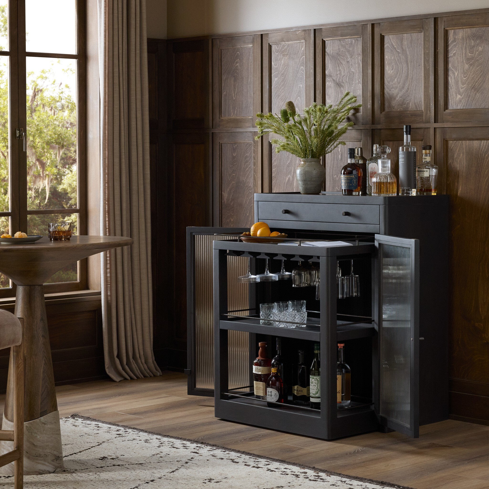 Four Hands Santiago Bar Cabinet — Smoked Black Mango-Fluted Glass-Irish Brown Marble