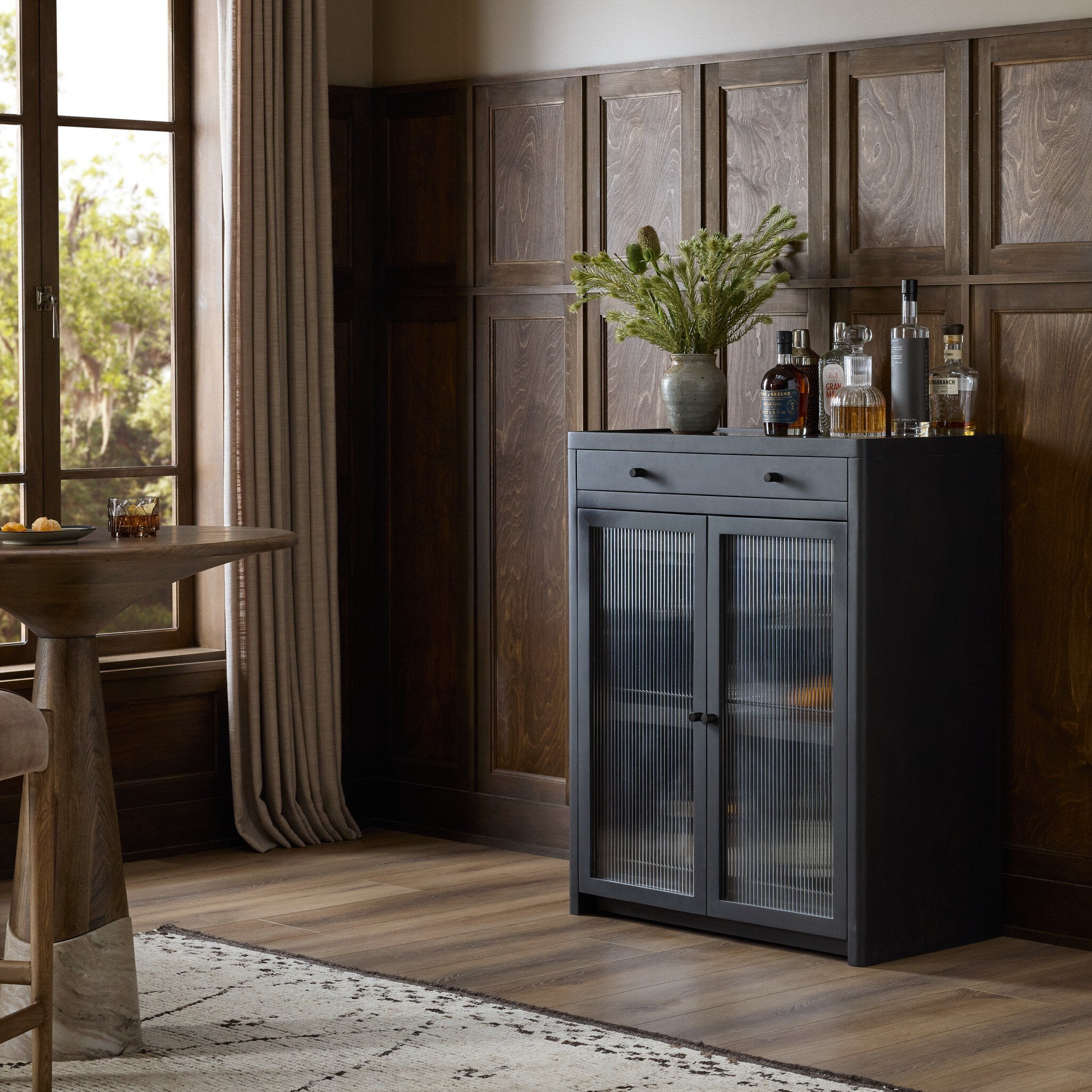 Four Hands Santiago Bar Cabinet — Smoked Black Mango-Fluted Glass-Irish Brown Marble