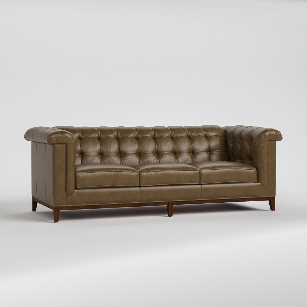 Stickley Fairfax 98-inch Sofa — button-tufted Defy Gravity leather on a Dark Maple base, three-quarter view