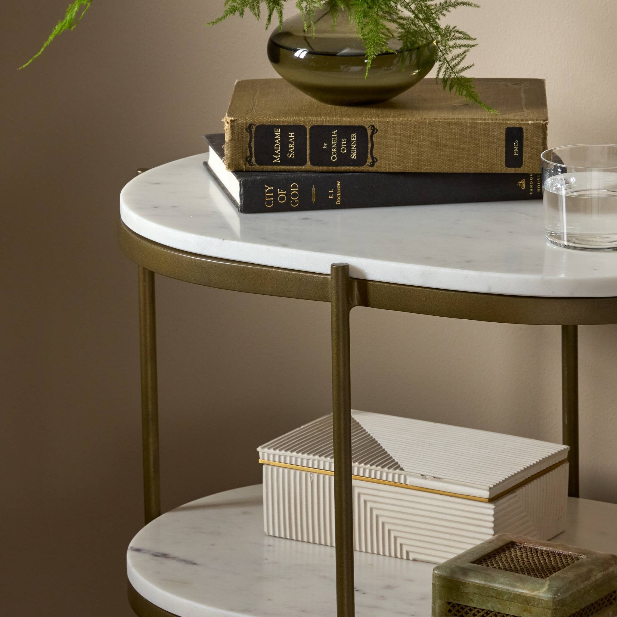 Four Hands Felix Oval Nightstand — Antique Brass-Polished White Marble