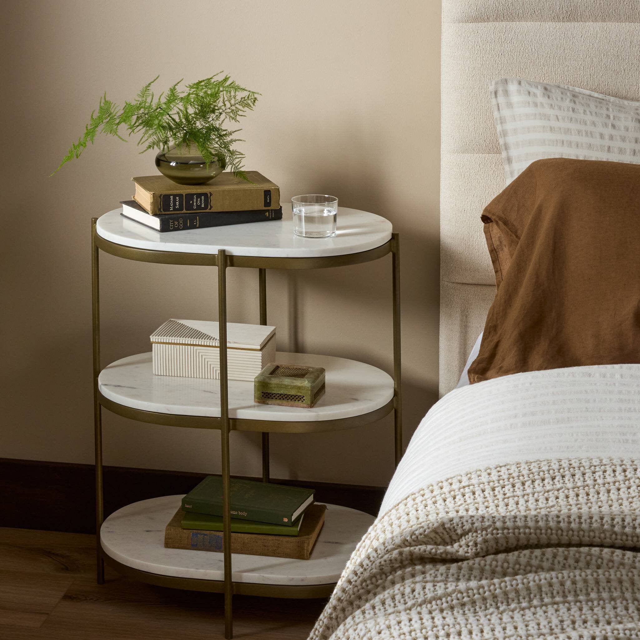 Four Hands Felix Oval Nightstand — Antique Brass-Polished White Marble
