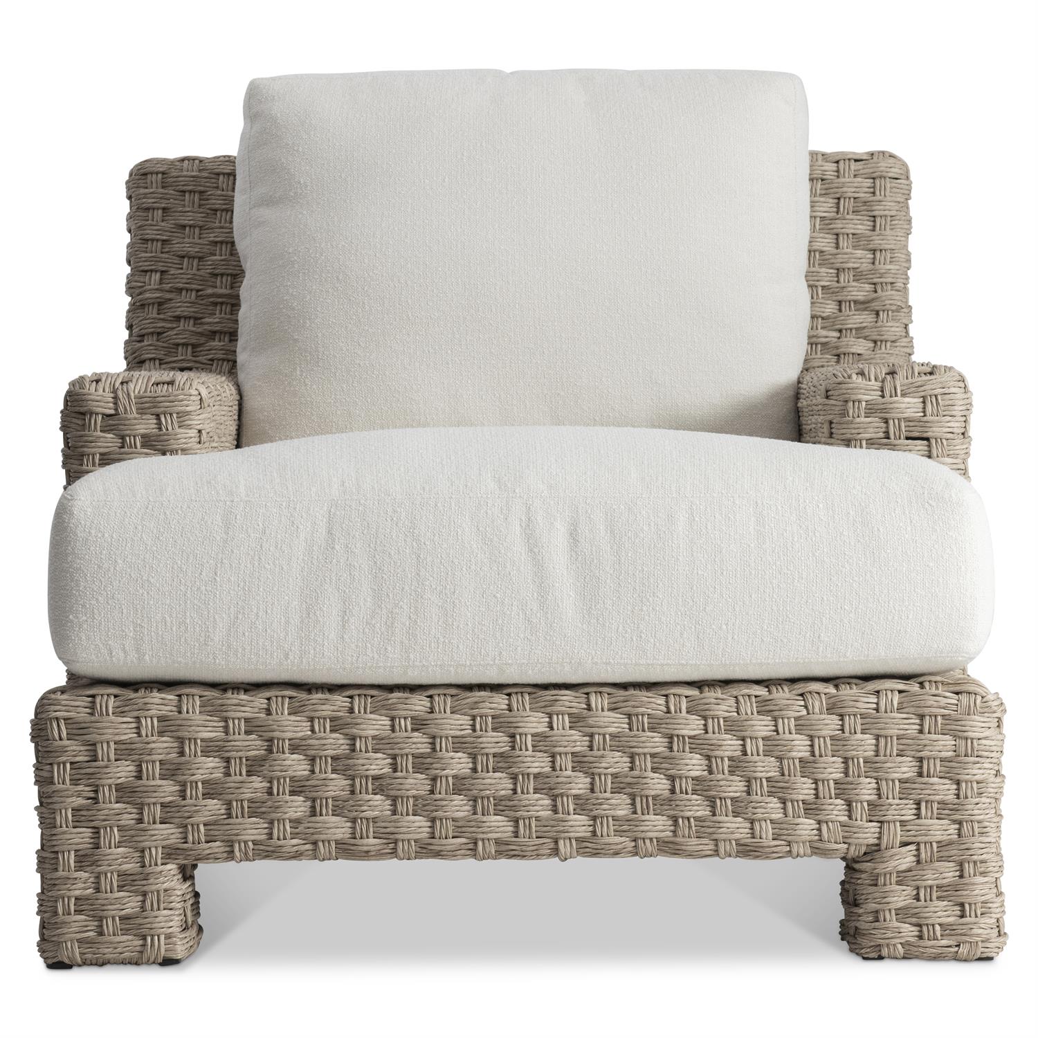 A contemporary outdoor lounge chair with a deep-weave all-weather wicker frame in a Pampas finish. The chair features wide armrests and thick, plush white cushions for ultimate outdoor relaxation.