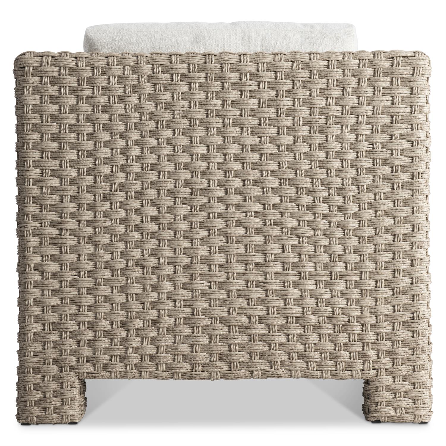 The rear view of an outdoor lounge chair, highlighting the elegant deep-weave wicker construction and high-back design for full support and durability.