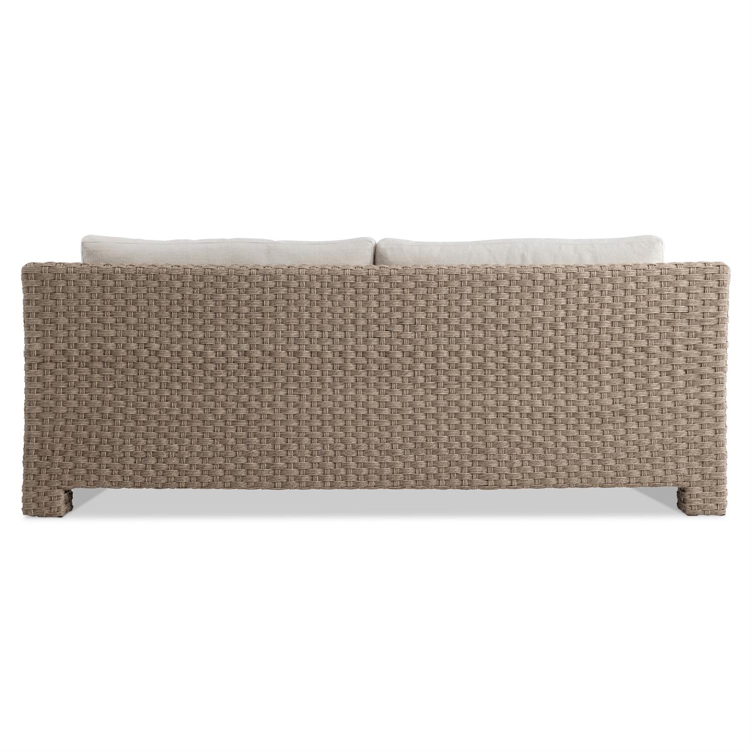 The rear view of the outdoor sofa, displaying the detailed deep-weave wicker construction. The high backrest supports plush cushions, ensuring both style and relaxation in an outdoor setting.
