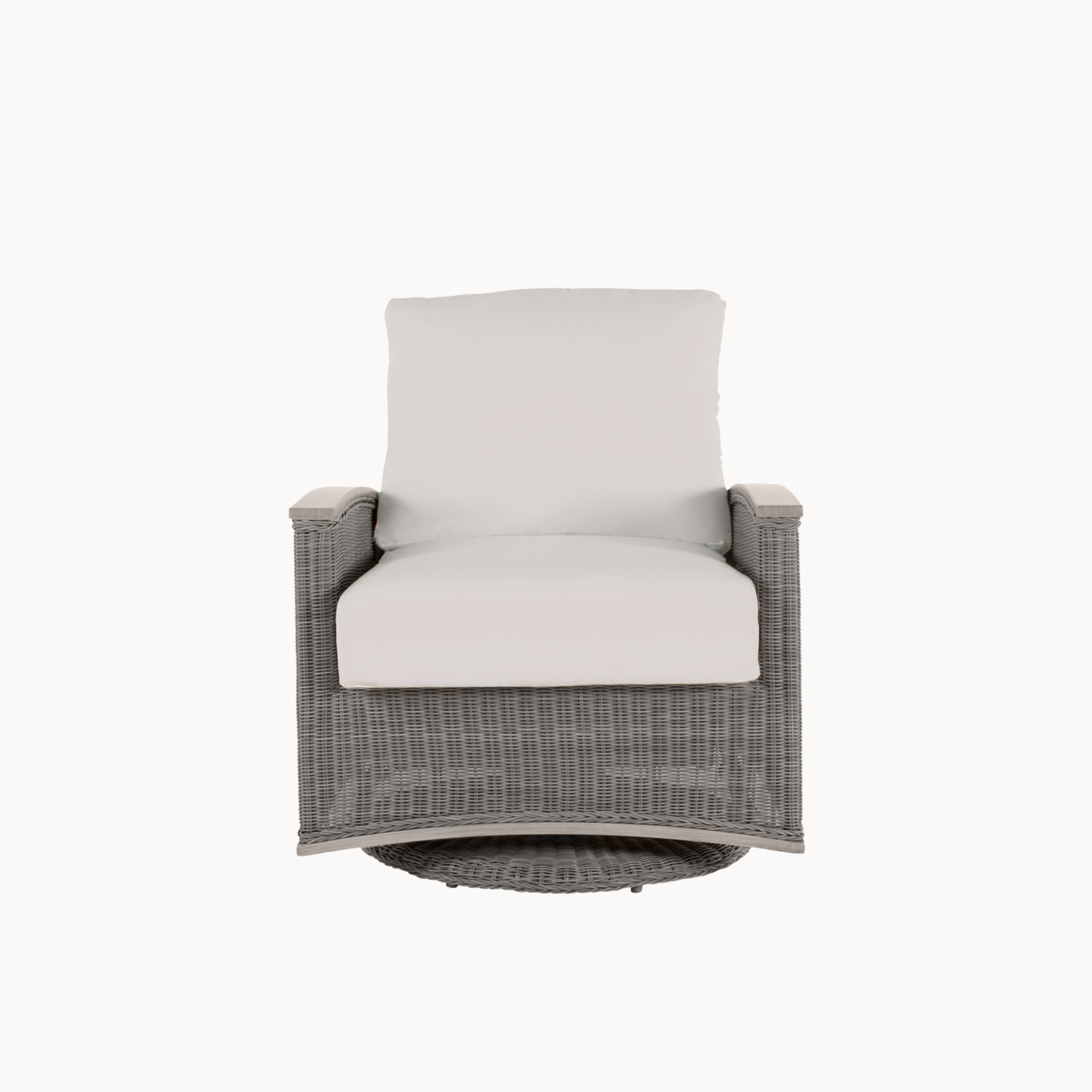 Wicker chair with white cushion on a white background