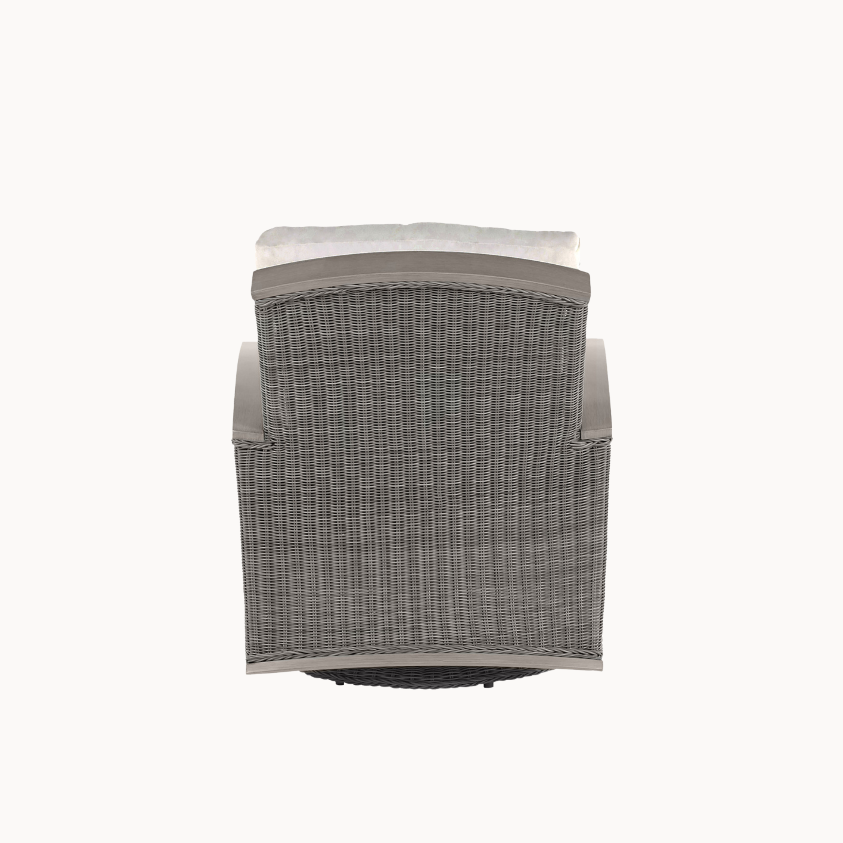 Wicker chair with a cushion on a white background