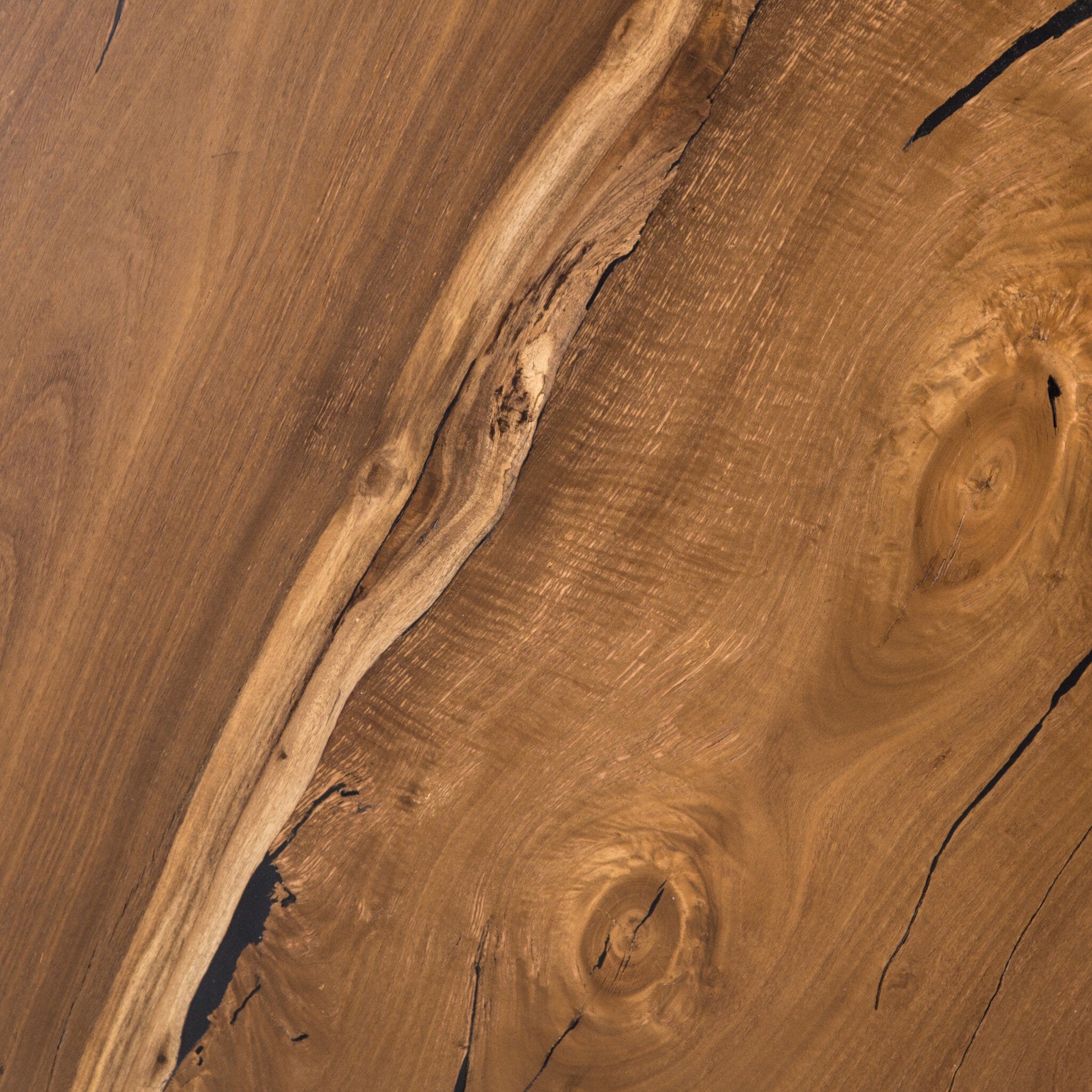 Four Hands Hudson Round Coffee Table — Natural Yukas Resin-Black Pine