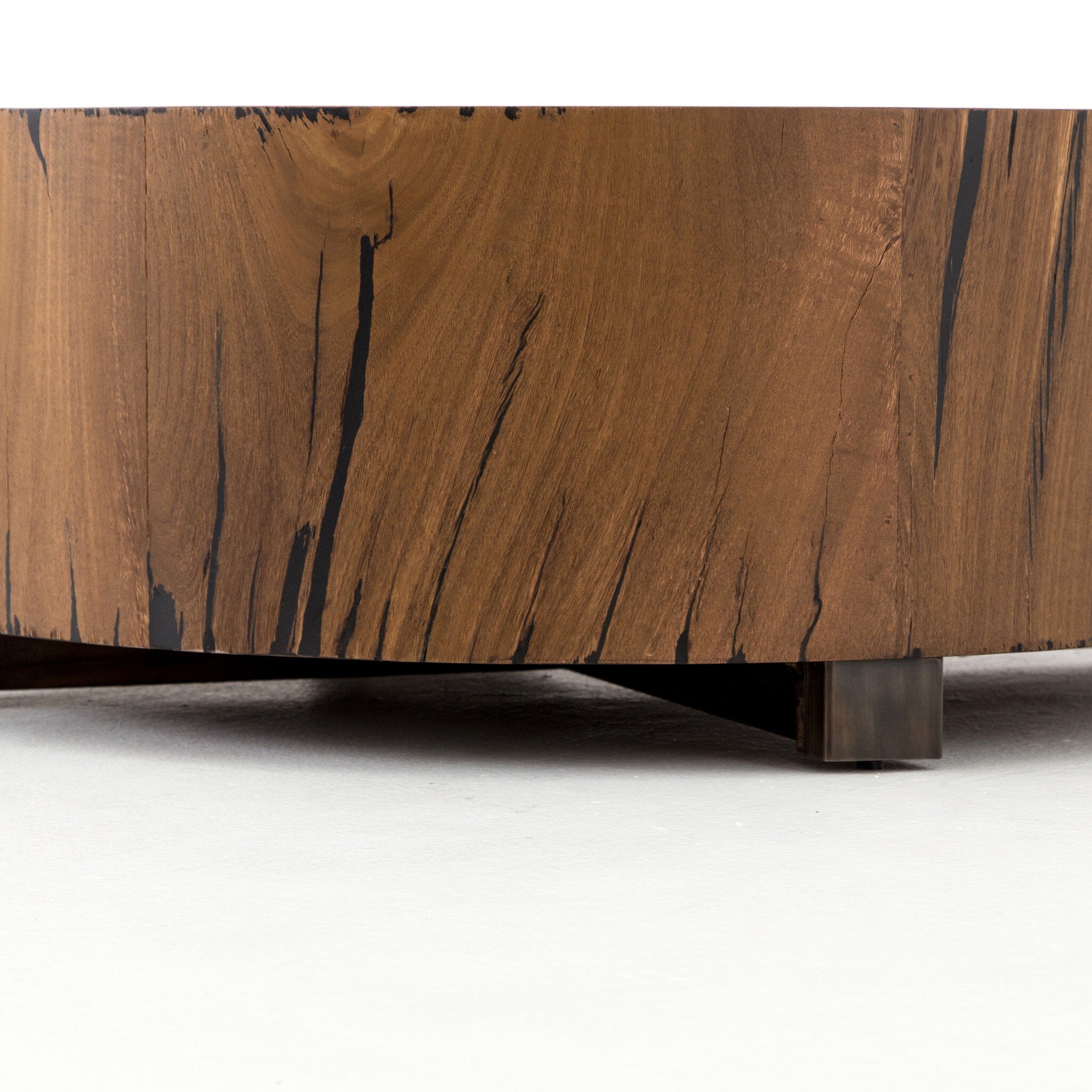 Four Hands Hudson Round Coffee Table — Natural Yukas Resin-Black Pine