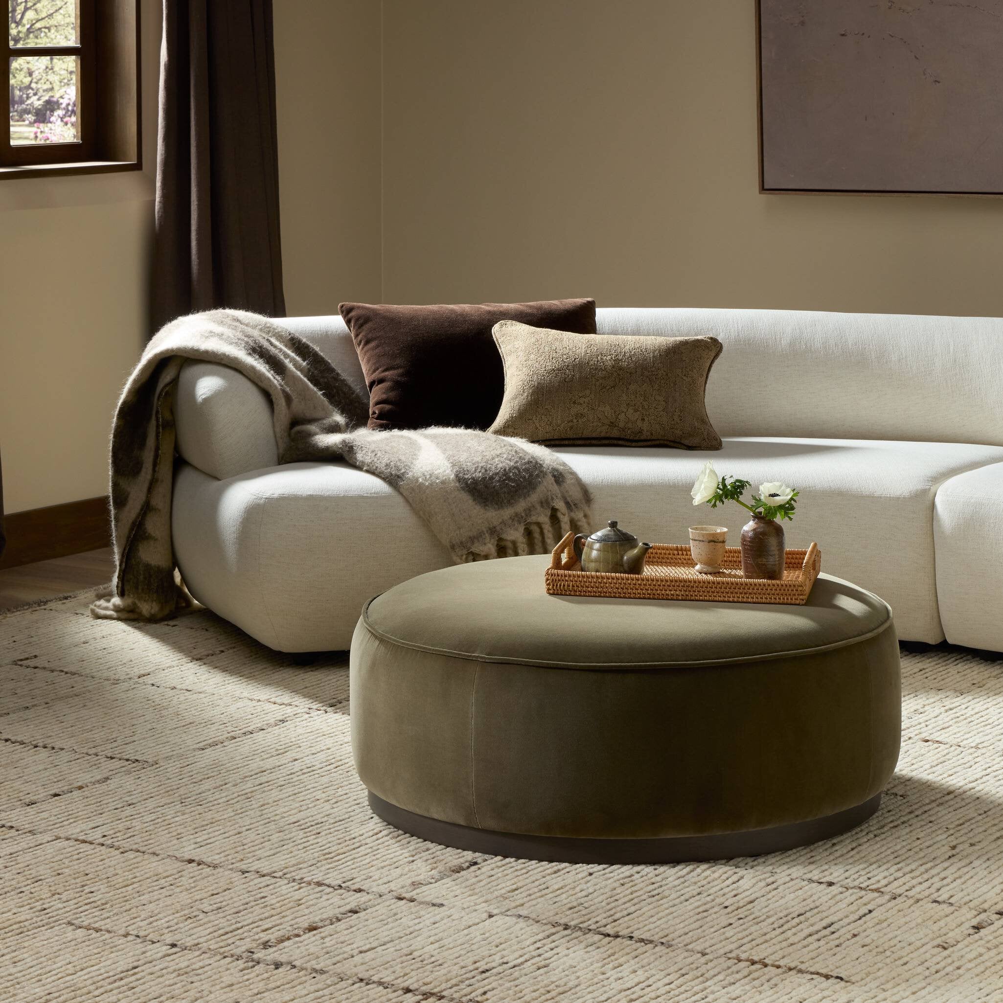 Four Hands Sinclair Large Round Ottoman — Surrey Olive-Sienna Brown