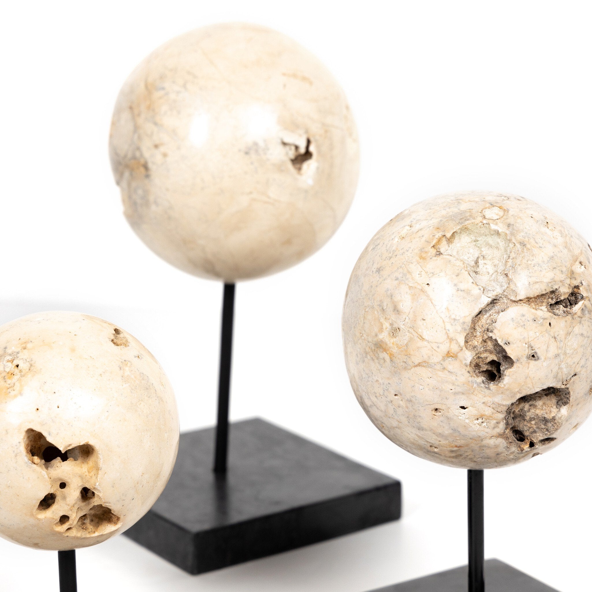 Four Hands Organic Stone Sculptures, Set Of 3 — Romano Fosse Travertine-Matte Black Iron-Black Marble