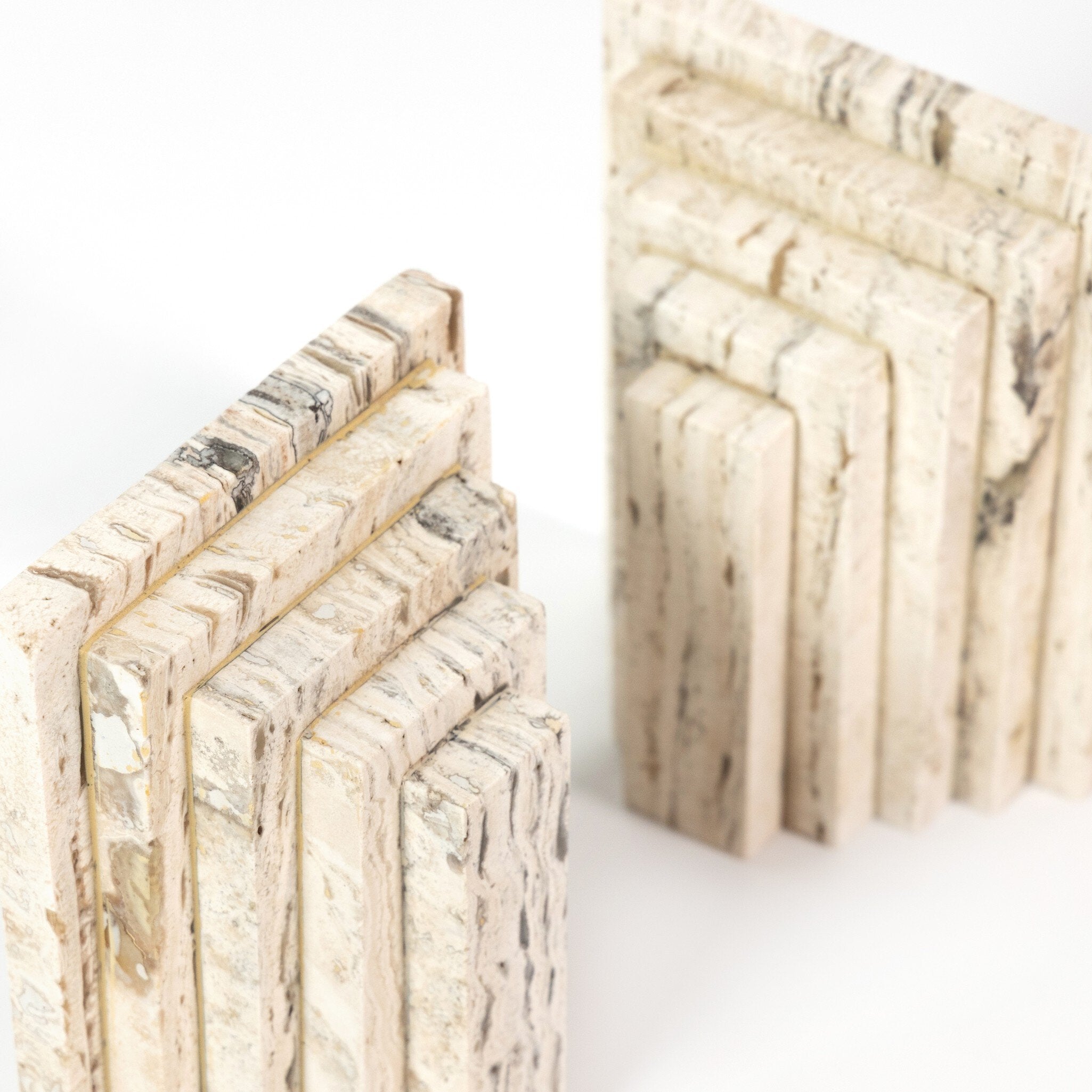 Four Hands Stepped Bookends — White Travertine