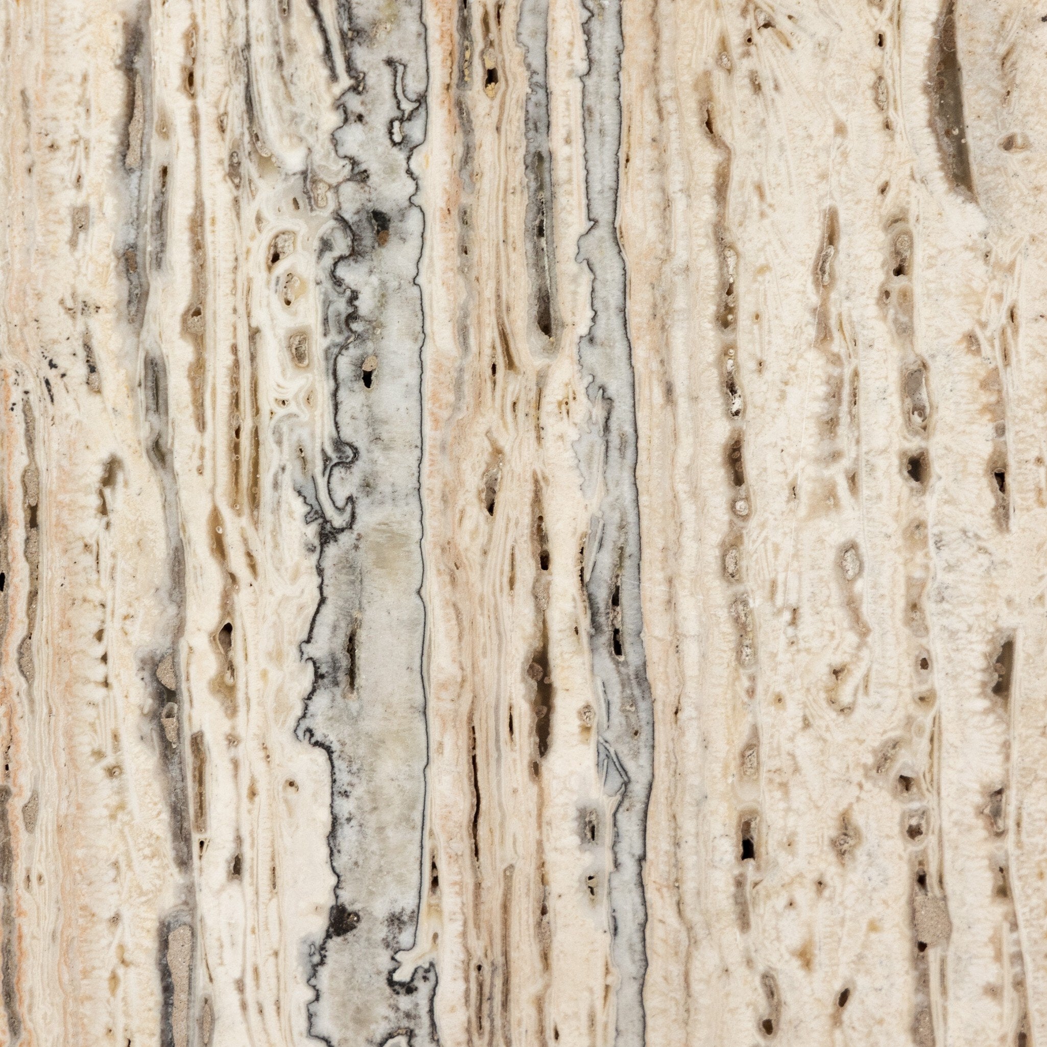 Four Hands Stepped Bookends — White Travertine
