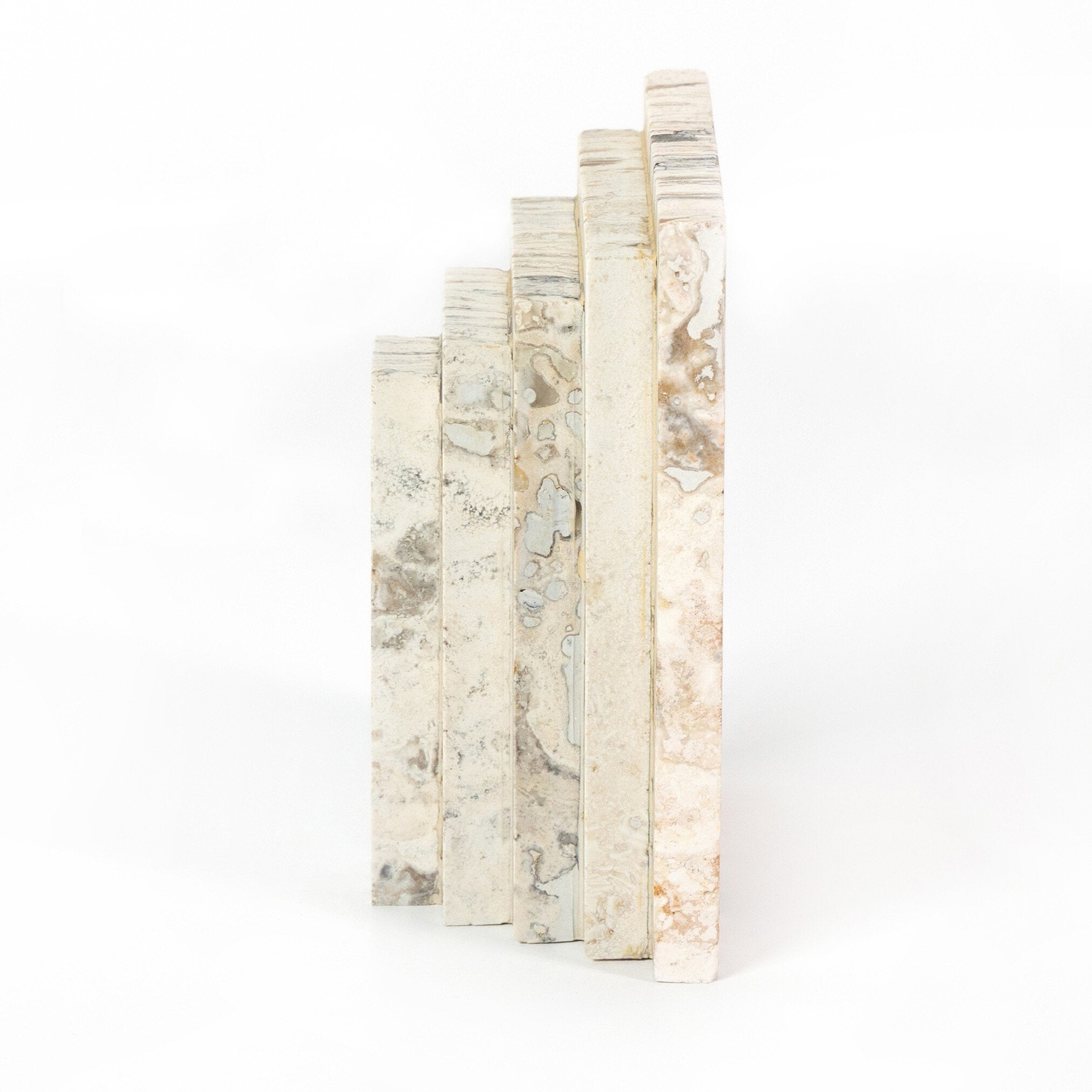 Four Hands Stepped Bookends — White Travertine