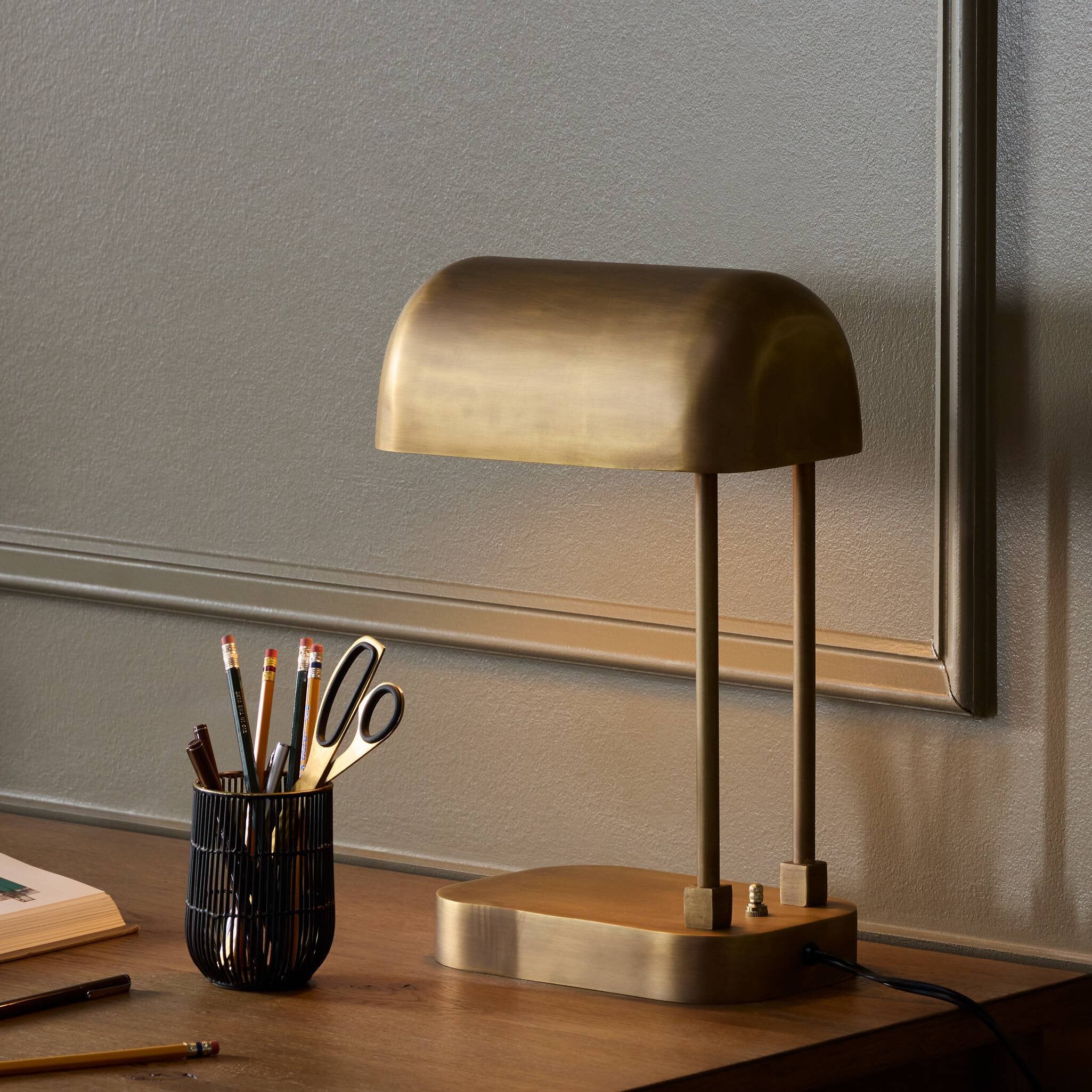 Four Hands Merlin Table Lamp — Aged Antique Brass-Black Cord