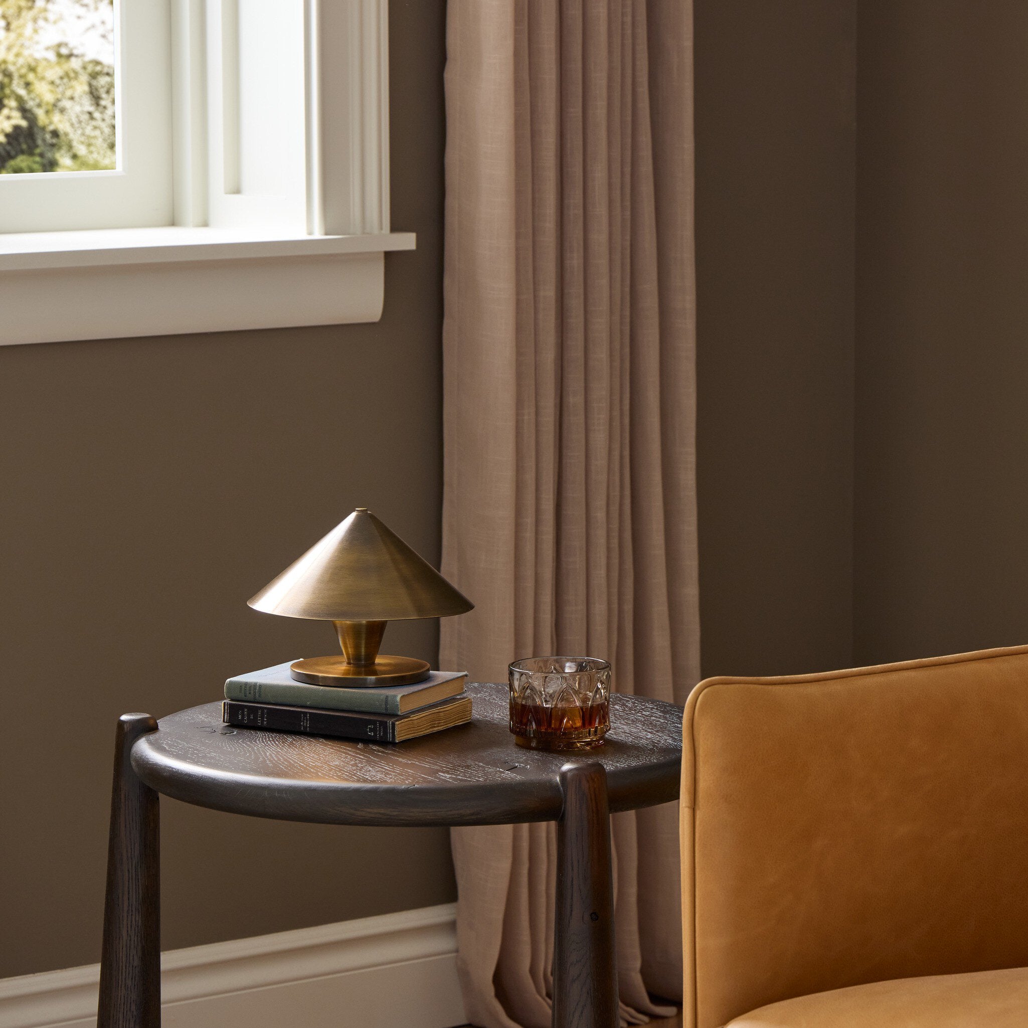 Four Hands Nyra Cordless Table Lamp — Aged Antique Brass Iron