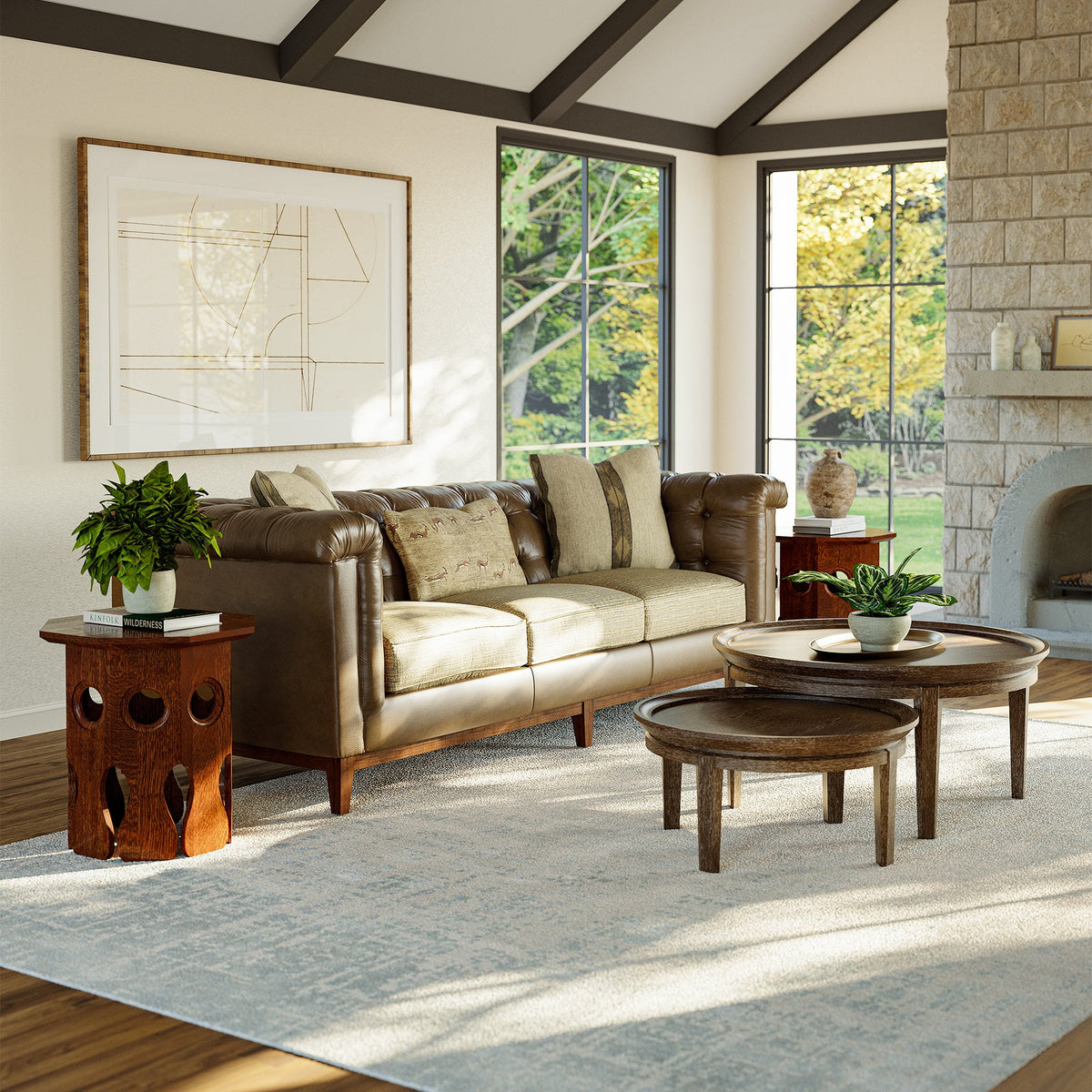 Stickley Fairfax 98-inch Sofa — leather and fabric Perfect Pairings cover in a sunlit living room with round nesting tables
