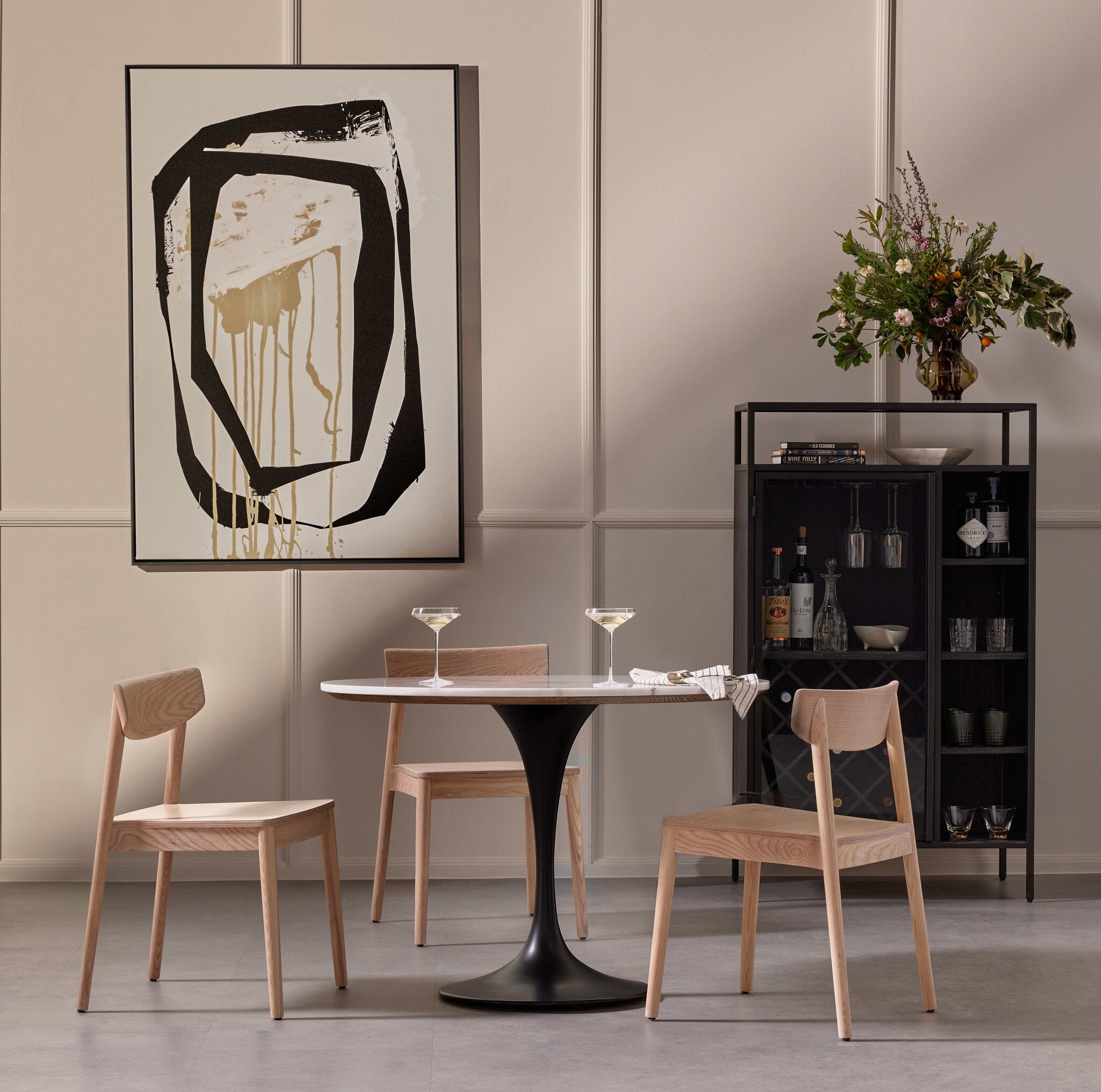 Four Hands Powell Dining Table — Dark Rustic Black-Weathered Ash-White Marble