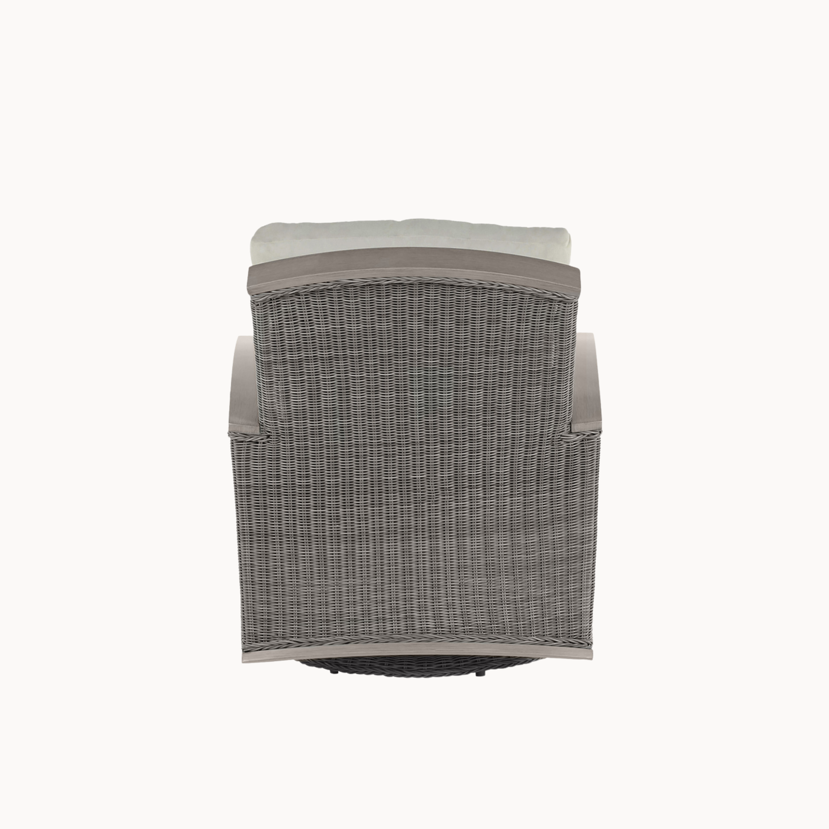 Wicker chair with a cushion on a white background