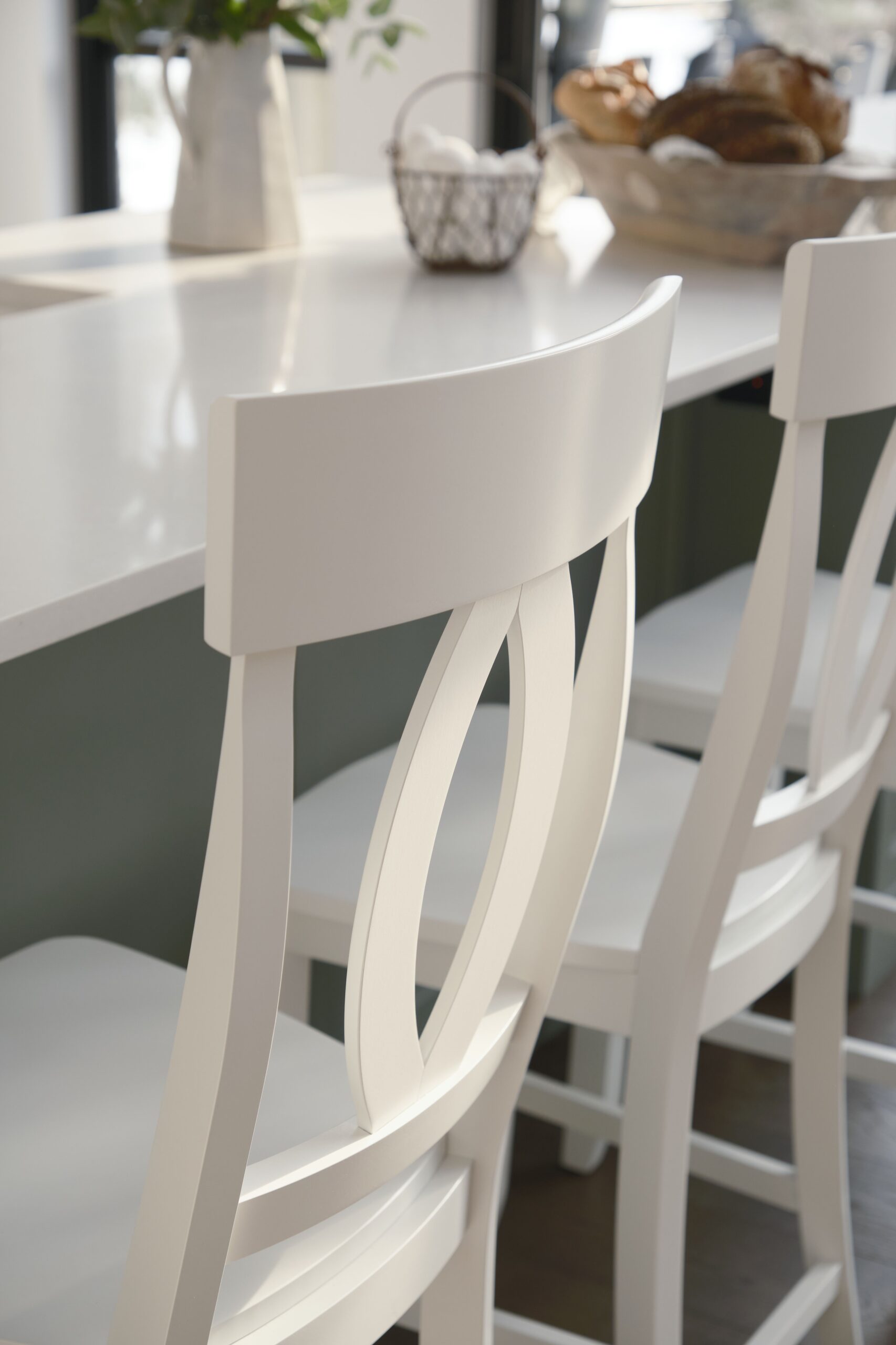 Detail of Canadel chair backs showing a durable hand-applied finish